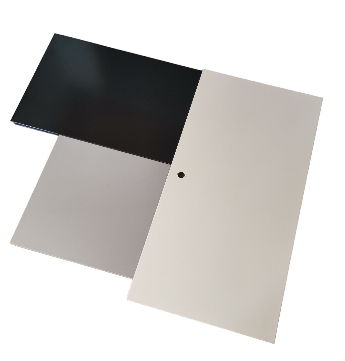 USM Haller Ersatzteile Set, Mängelexemplar: Drei Metallplatten in Schwarz, Grau und Weiß für modulare Möbel.